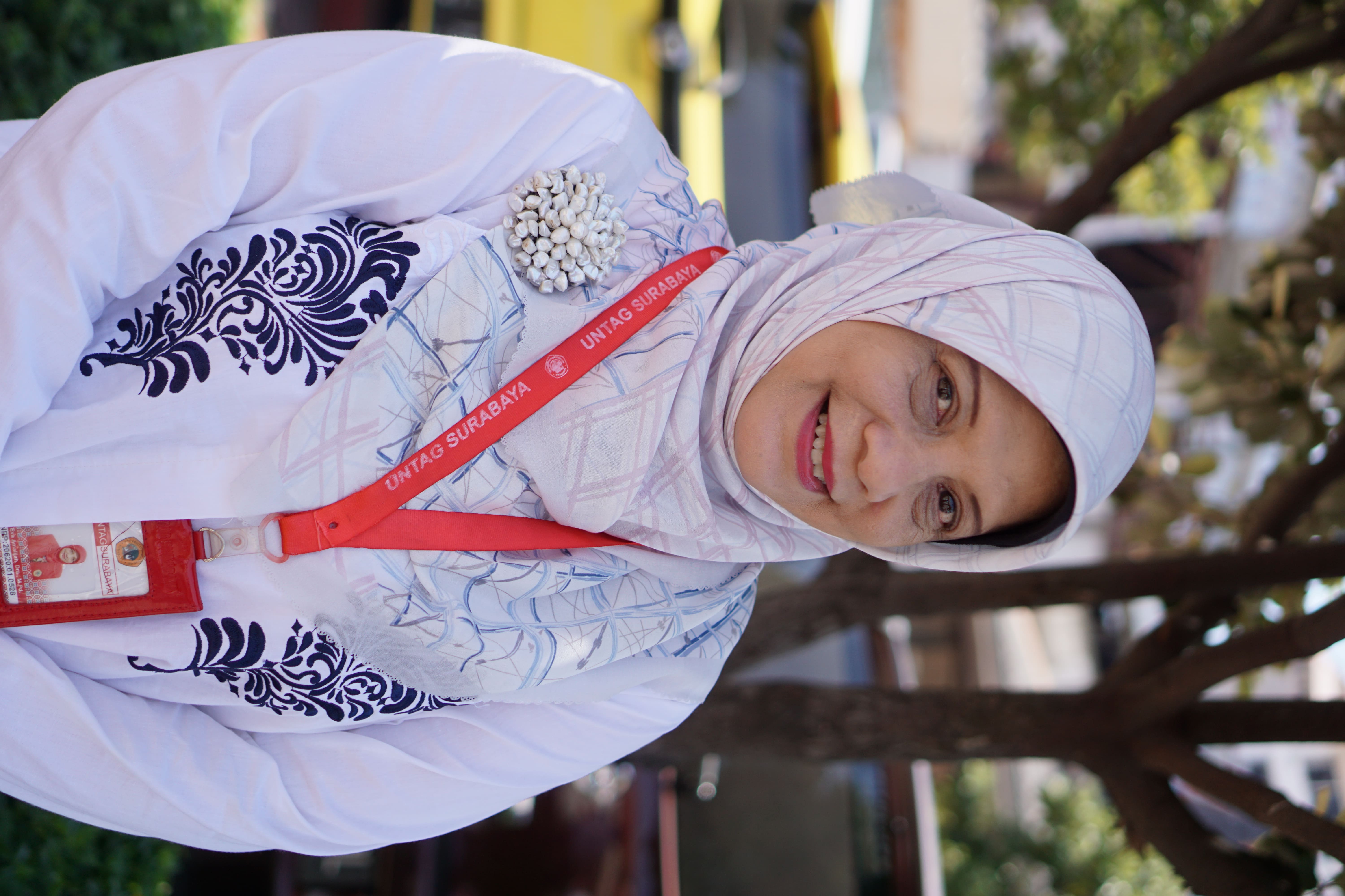 Dra. Eva Amalijah, M.Pd